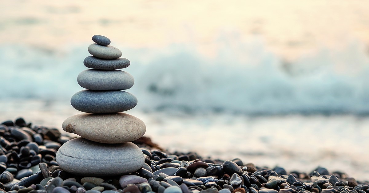 Balanced stones on a beach
