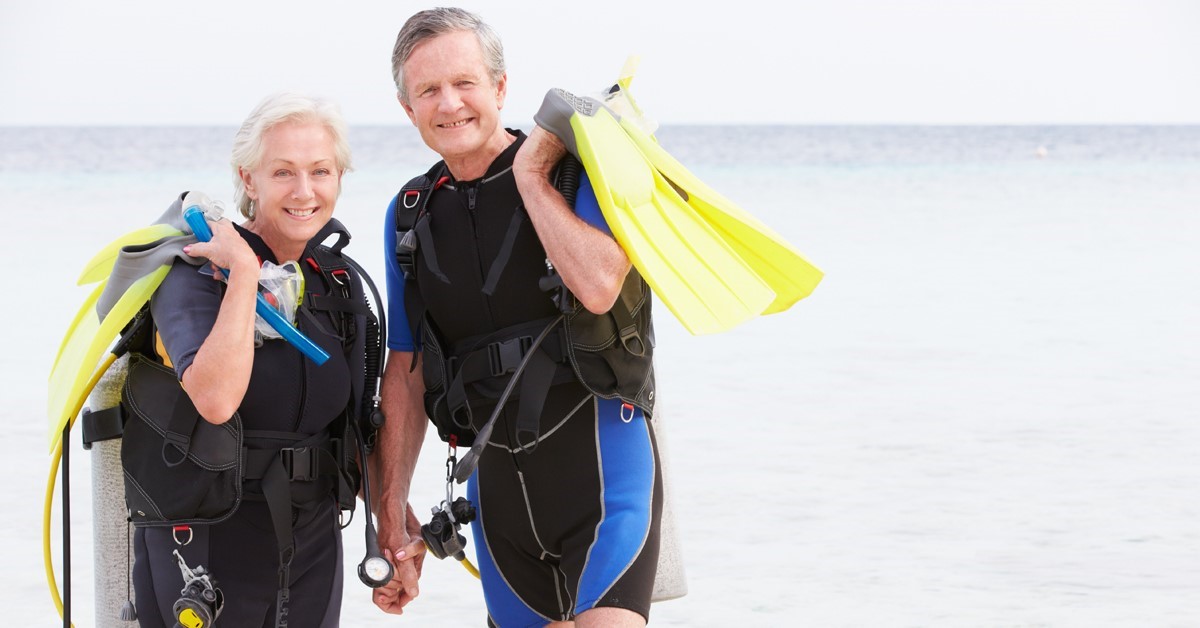 Retired couple with scuba gear